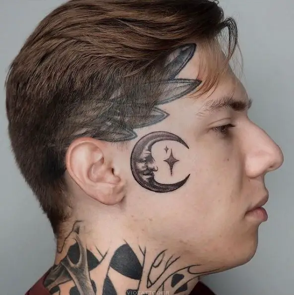 Crescent Moon Face and Spark Tattoo