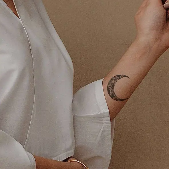 Crescent Moon and Sun Flowers Forearm Tattoo