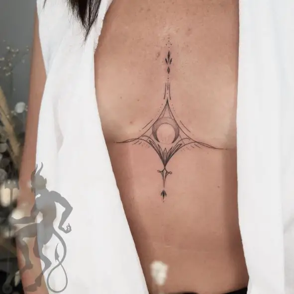Crescent Moon and Symbol Chest Tattoo
