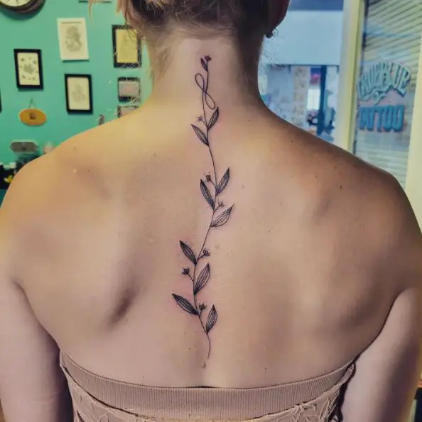 Fine Line Vine Spine Tattoo
