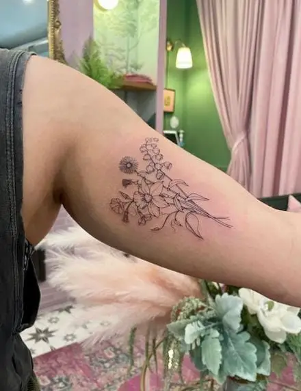 Flower Bunch Tattoo of Lily of the Valley, Aster, Morning Glory, and Daffodil
