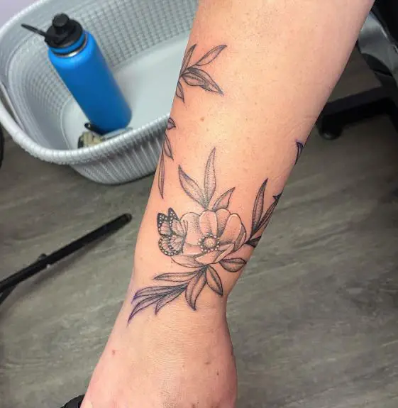 Flowers and Butterfly Wrist Vine Tattoo