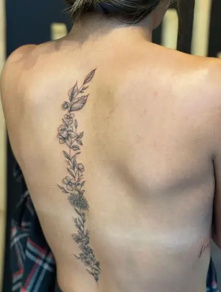 Greyscale Flowers and Leaves Vine Spine Tattoo