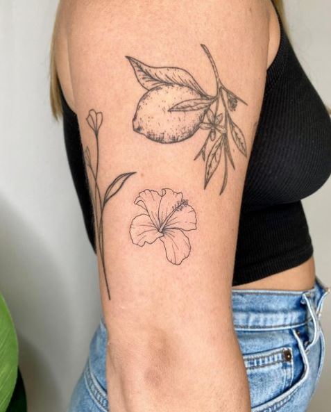 Hibiscus Flower and Lemon Arm Tattoo