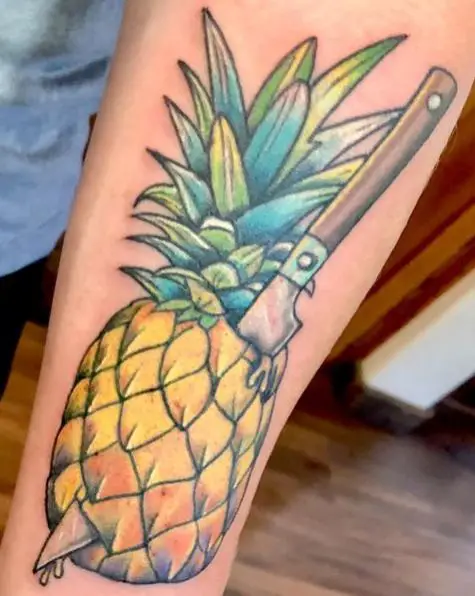 Knife Poked Pineapple Tattoo
