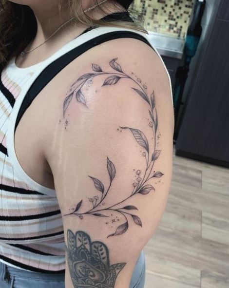 Leaf and Flowers Vine Arm Tattoo