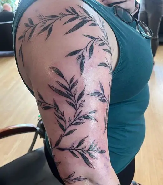 Leaves Vine Arm Wraparound Tattoo