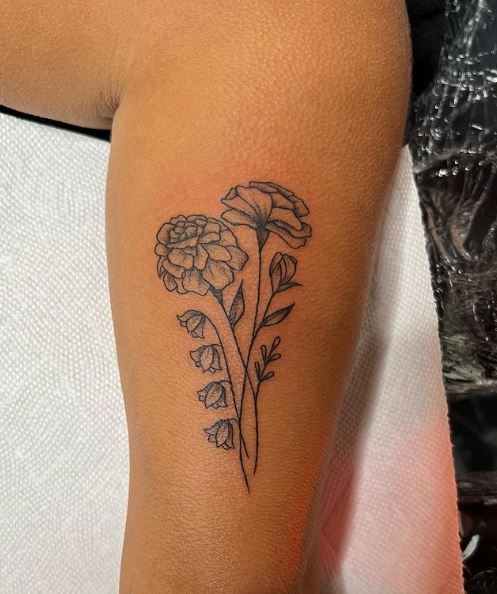Marigold and Lily of the Valley Tattoo on Leg