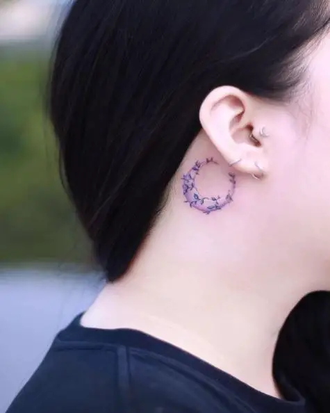 Minimalistic Crescent Moon Tattoo With Plant