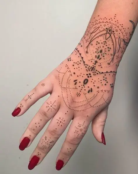 Ornamental Hand Tattoo Piece with Dots and Lines
