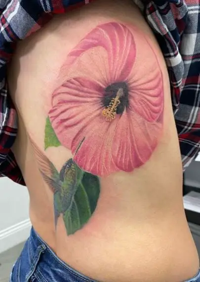 Pink Hibiscus Flower with a Green Hummingbird Rib Tattoo