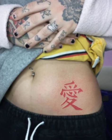 Red Gaara Tattoo on the Hip