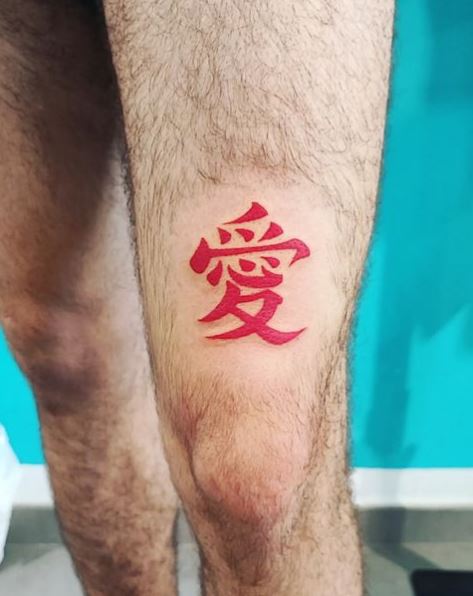 Red Kanji Thigh Tattoo