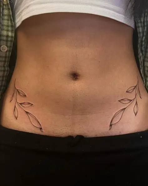 Simple Fineline Leaves Tattoo on the Hip