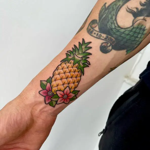 Small Pineapple and Flowers Wrist Tattoo