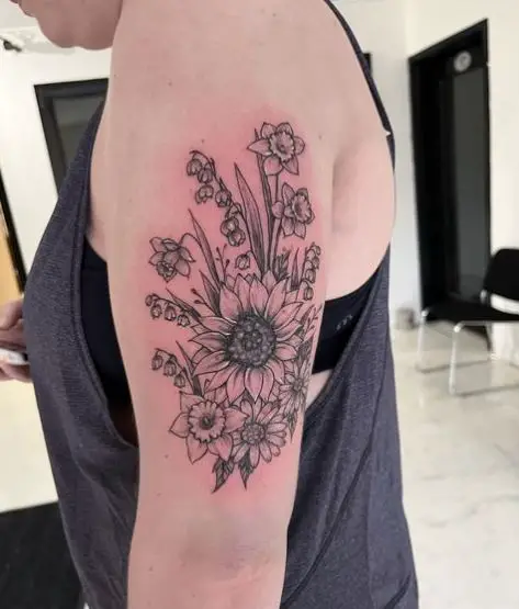 Sunflower and Lily of the Valley Arm Tattoo