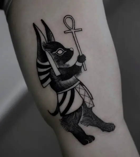 Tattoo of Cute Anubis Carrying A Flail