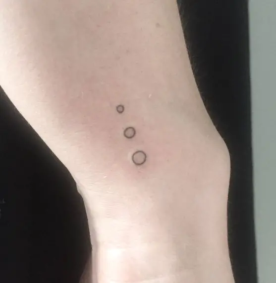 Three Delicate Dots Tattoo on the Wrist