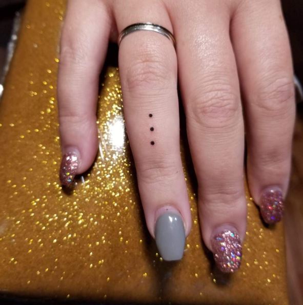 Three Dots Finger Tattoo