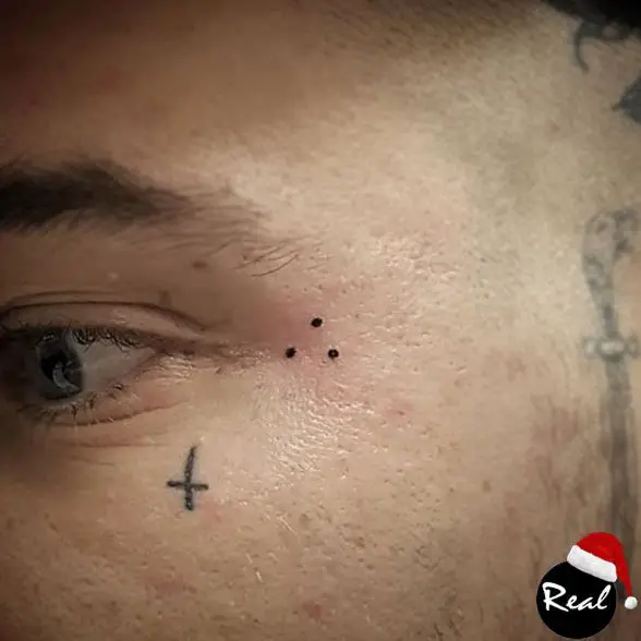 Three Simple Dots Tattoo Next to Eye