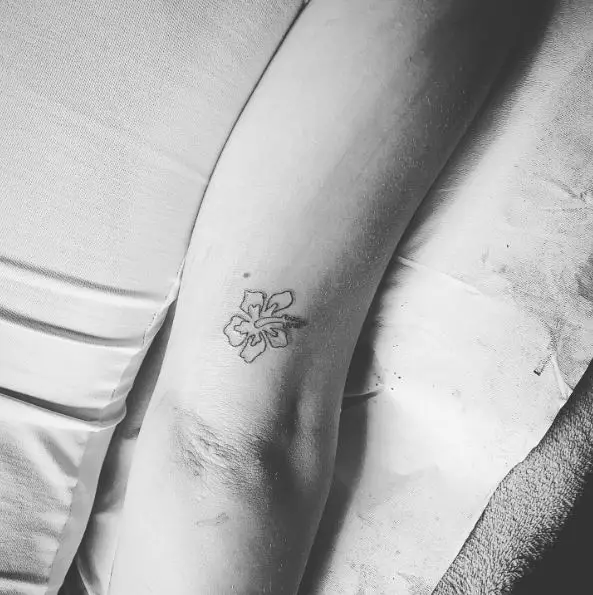 Tiny Hibiscus Flower Arm Tattoo