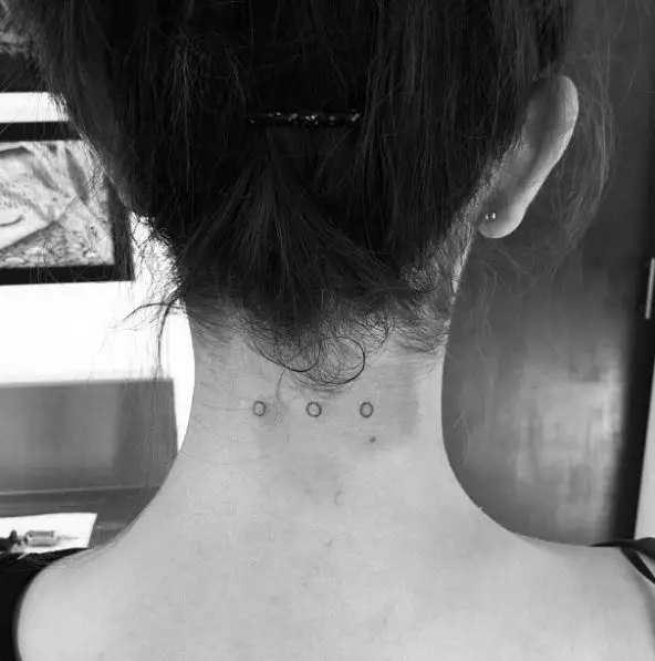 Tribal Tattoo of Three Dots on the Neck