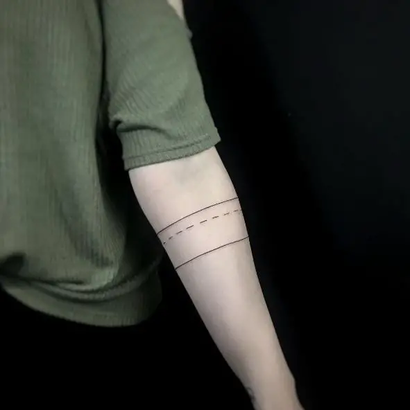 Two Thin Lines and a Dashed Line Tattoo