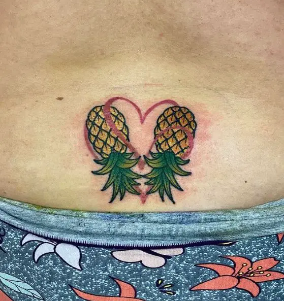 Upside Down Pineapples with a Heart Tattoo