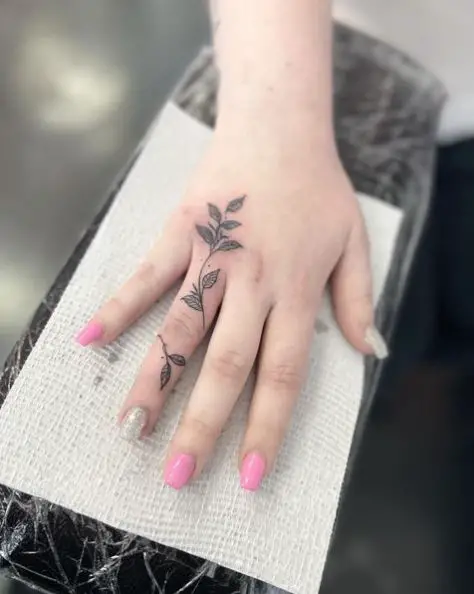 Vine finger tattoo