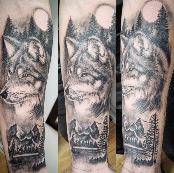 Night Landscape and Wolf Forearm Tattoo