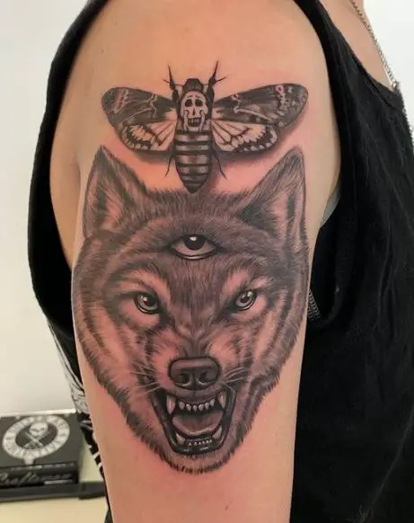 Wolf and Death Moth Arm Tattoo