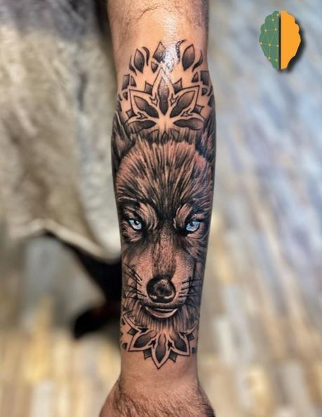 Mandala and Wolf with Blue Eyes Forearm Tattoo