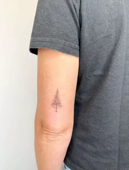 Minimalistic Pine Tree Elbow Tattoo