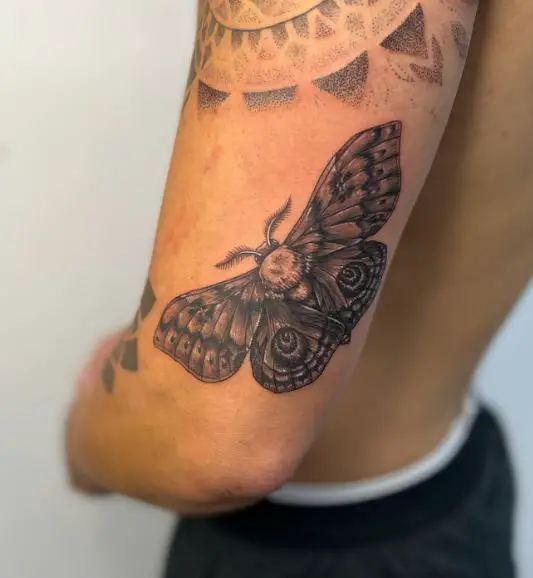 Black and Grey Death Moth Arm Tattoo