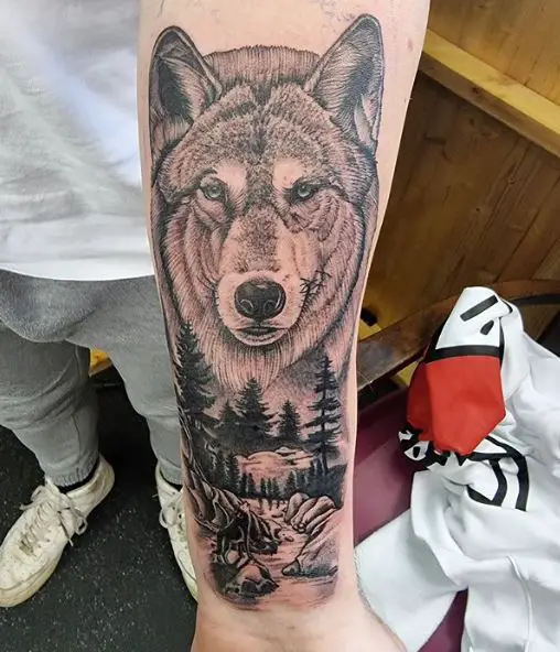 Mountain Landscape and Wolf Forearm Tattoo