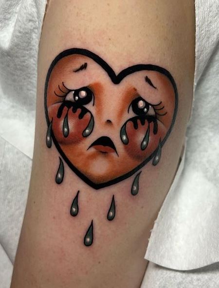Round Cheeks on Crying Heart Tattoo