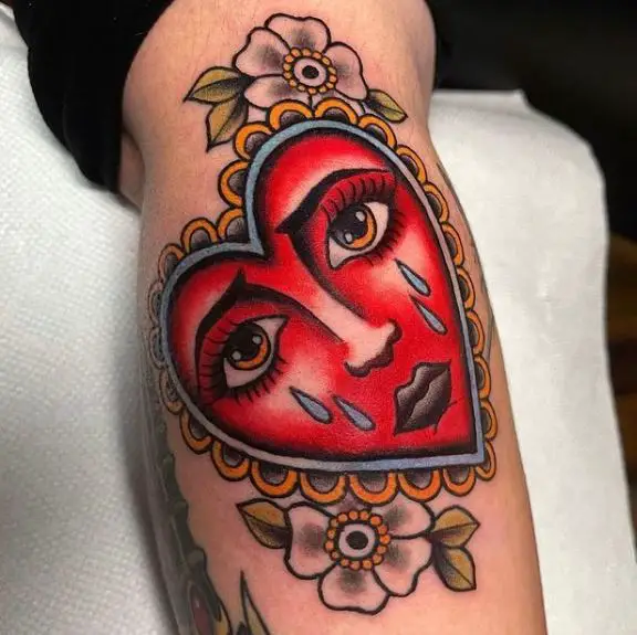 Flowers and Red Crying Heart Forearm Tattoo