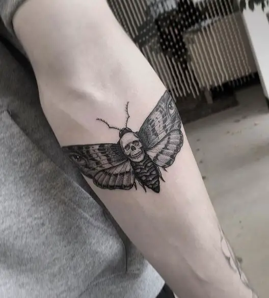 Small Death Moth Elbow Tattoo
