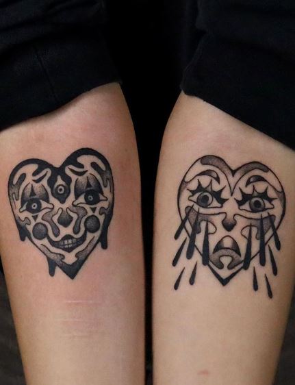 Clown Heart and Crying Heart Forearm Tattoos