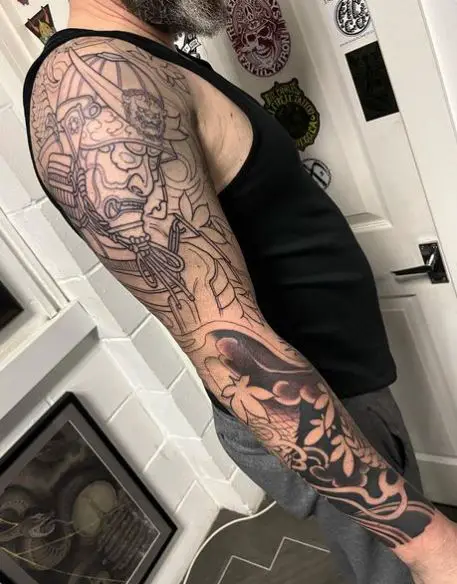 Flowers and Samurai Arm Sleeve Tattoo