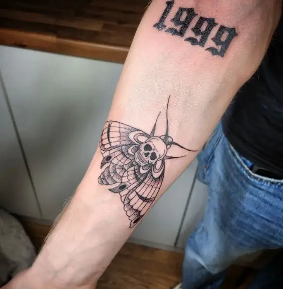 Grey Death Moth Forearm Tattoo
