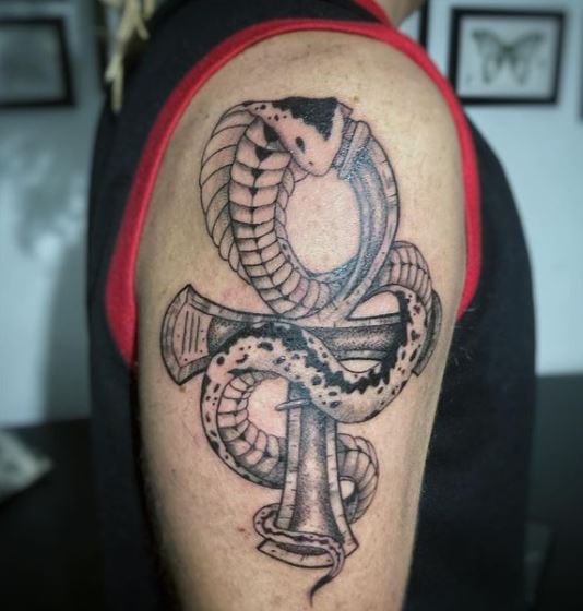 Cross and Cobra Combined to Ankh Arm Tattoo
