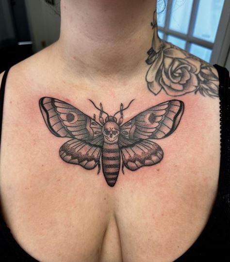 Grey Shaded Death Moth Chest Tattoo