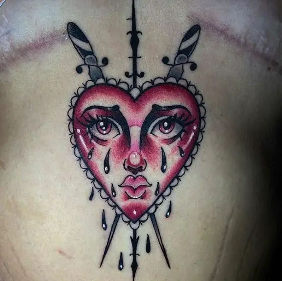 Daggers and Crying Heart Stomach Tattoo