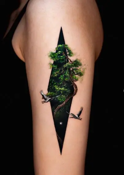Birds and Pine Tree Arm Tattoo