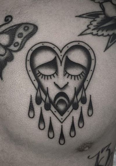 Butterfly and Crying Heart Chest Tattoo