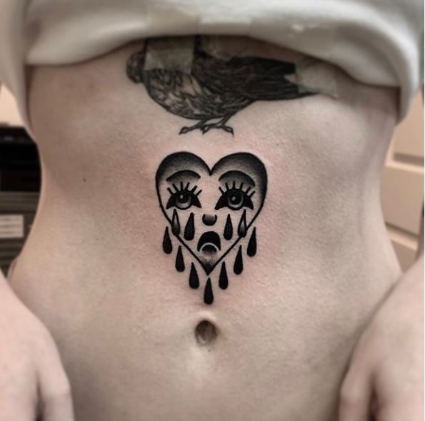 Bird and Crying Heart Stomach Tattoo