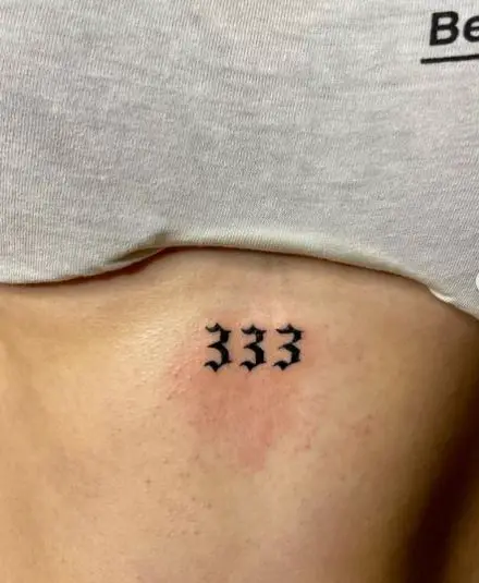 Bold Black 333 Stomach Tattoo
