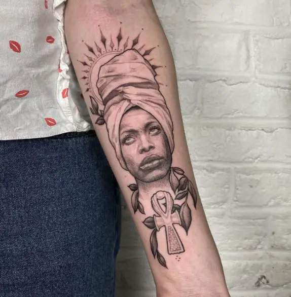 Erykah Badu and Ankh Forearm Tattoo