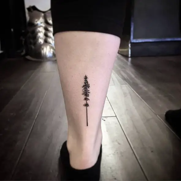 Minimalistic Pine Tree Leg Tattoo